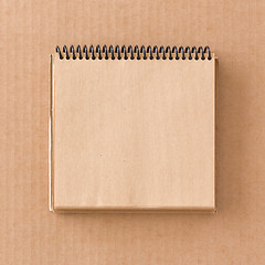 Image showing Notepad on cardboard