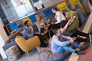 Image showing startup Office Workers Playing computer games