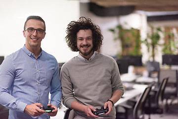 Image showing startup Office Workers Playing computer games