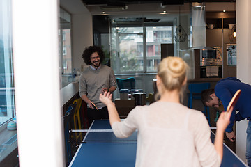 Image showing startup business team playing ping pong tennis