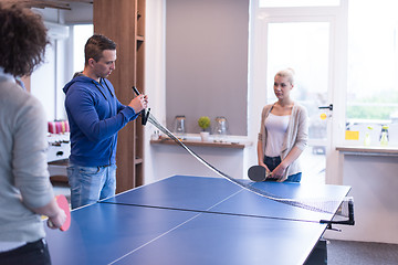 Image showing startup business team playing ping pong tennis