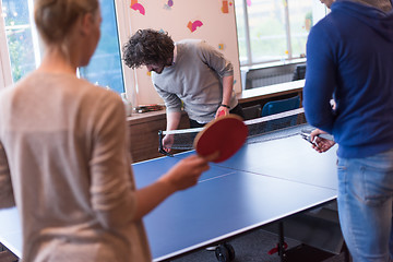 Image showing startup business team playing ping pong tennis