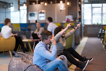 Image showing startup Office Workers Playing computer games