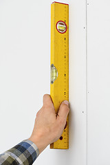 Image showing Working with spirit level