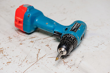 Image showing Electric screwdriver at working surface