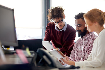 Image showing business team with tablet pc computers in office