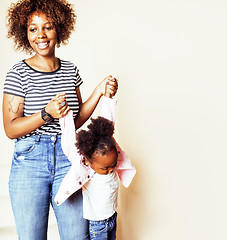 Image showing adorable sweet young afro-american mother with cute little daugh