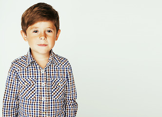 Image showing young pretty little cute boy kid wondering, posing emotional fac