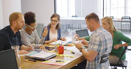 Image showing Colleagues in process of work