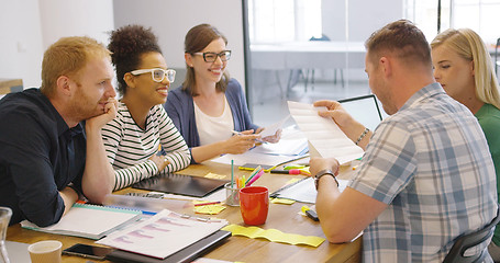 Image showing Young coworkers in office