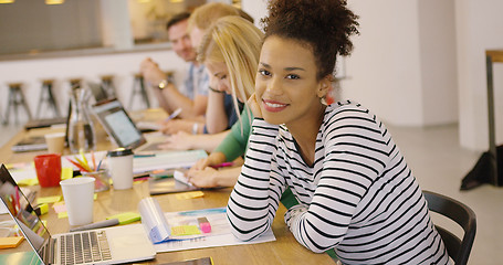 Image showing Beautiful worker posing at camera