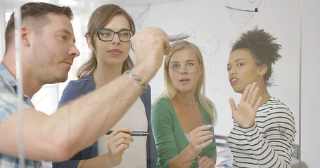 Image showing Coworkers in process of creation 