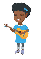 Image showing African girl singing and playing acoustic guitar.