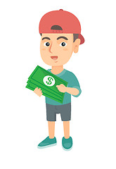 Image showing Caucasian boy in a cap holding money in hands.