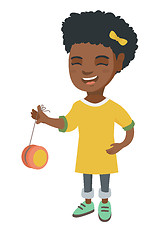 Image showing African-american girl playing with yo-yo.