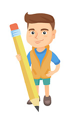 Image showing Caucasian kid boy standing with a huge pencil.