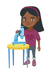 Image showing Little african schoolgirl using a microscope.