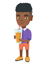 Image showing Boy drinking orange juice through a straw.
