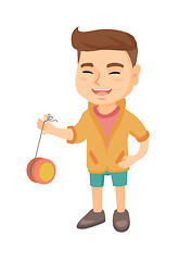 Image showing Caucasian boy playing with yo-yo.