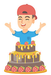 Image showing Little caucasian boy jumping out of a large cake.