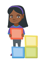 Image showing Little african girl playing with clourful cubes.