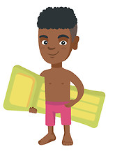 Image showing Little african boy holding inflatable mattress.