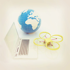 Image showing Drone or quadrocopter with camera with laptop. Network, online, 