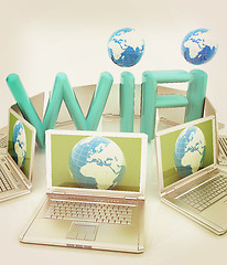 Image showing Global concept of  WiFi connectivity between laptops. 3d render.