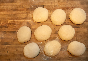 Image showing yeast bread dough on bakery kitchen table