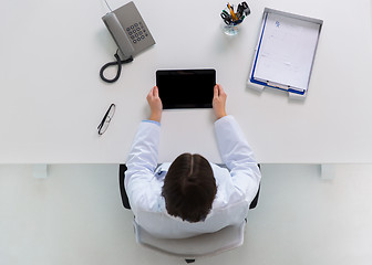 Image showing doctor with tablet pc at clinic