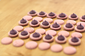 Image showing macarons on table at confectionery or bakery