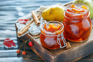 Image showing Homemade jam from pears in glass jars.