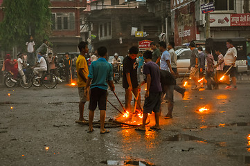 Image showing Boys around fireplace in Nepal