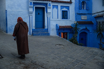 Image showing Man in Chefchaouen, the blue city in the Morocco.