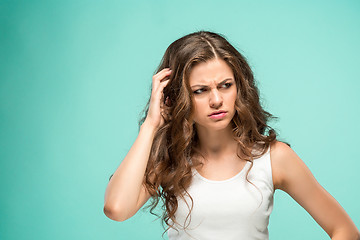 Image showing The young woman\'s portrait with sad emotions