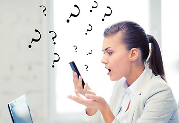 Image showing woman shouting into smartphone