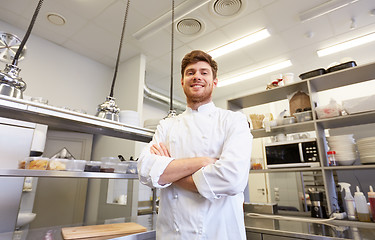 Image showing happy male chef cook at restaurant kitchen