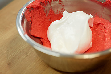 Image showing macaron batter with whipped egg whites in bowl