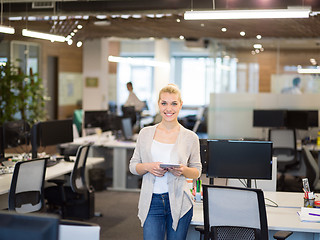 Image showing Business Woman Using Digital Tablet in front of startup Office