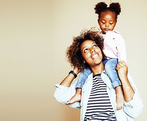 Image showing adorable sweet young afro-american mother with cute little daugh