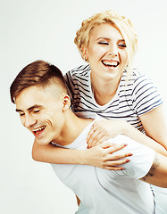 Image showing young pretty teenage couple, hipster guy with his girlfriend happy smiling isolated on background, lifestyle people concept close up,  real relationship 