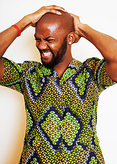 Image showing portrait of young handsome african man wearing bright green nati