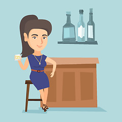 Image showing Young caucasian woman sitting at the bar counter.