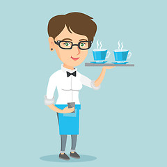 Image showing Waitress holding tray with cups of coffeee or tea.