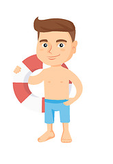 Image showing Little caucasian boy holding a red-white lifebuoy.