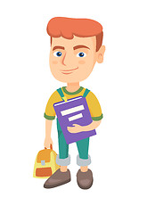 Image showing Caucasian pupil with backpack and textbook.