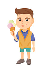 Image showing Little caucasian boy holding an ice cream cone.