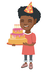 Image showing African child holding birthday cake with candles.
