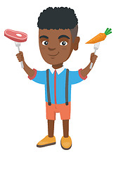 Image showing Little african boy holding fresh carrot and steak.