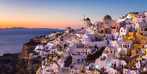 Image showing Oia village at sunset, Santorini island, Greece.